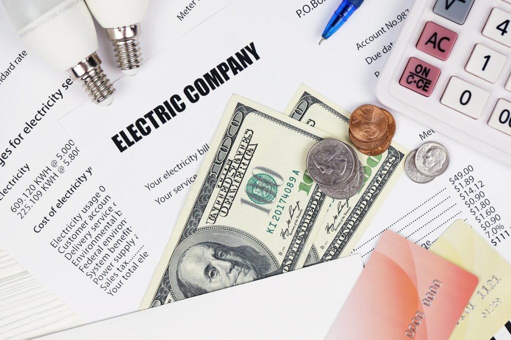 Abstract American electricity bill. Concept of saving money by using energy savings